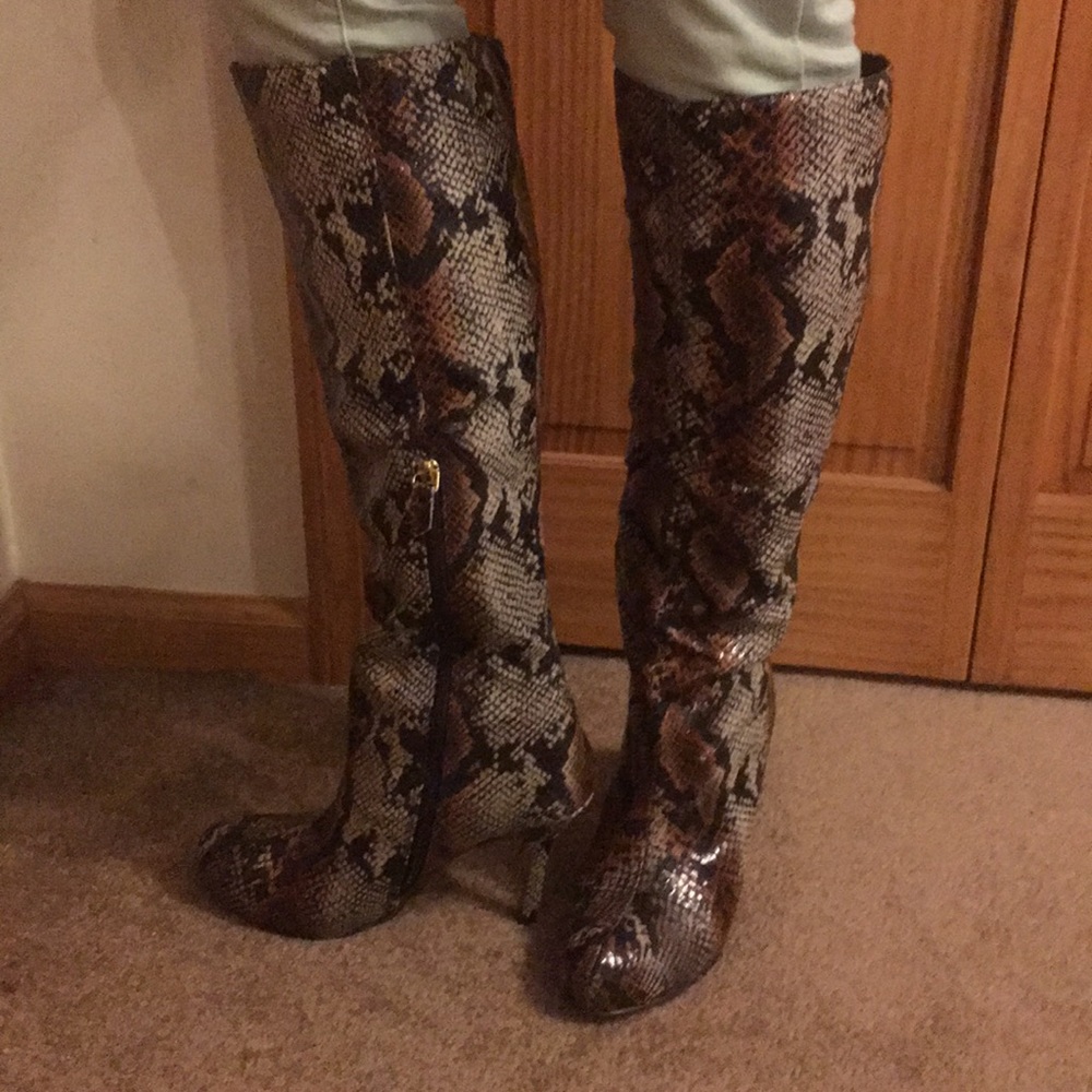 Knee high snake print boots